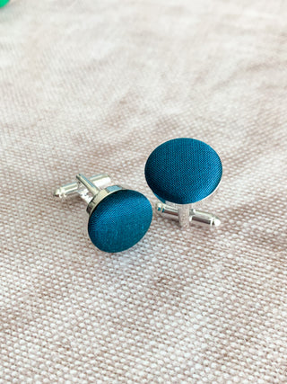 Luxury blue silk dupion cufflinks with a high-quality metal base, ideal for weddings, groomsmen, and special occasions. The perfect finishing touch for any formal outfit