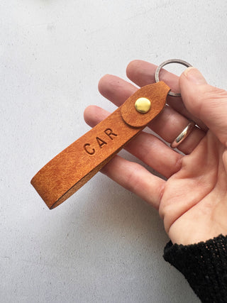 Personalised leather keyring in orange by Parkin & Lewis