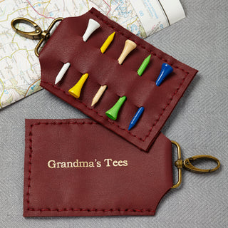 Luxury dark red leather golf tee holder with space for five wooden tees, personalised with gold embossed text. A perfect gift for golf lovers, grandads, and golf enthusiasts