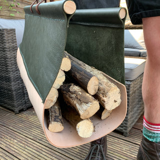 Made in Southwest London, this log carrier is constructed from two different types of leather.